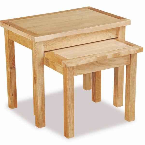 Set of two wooden nesting tables on a white background