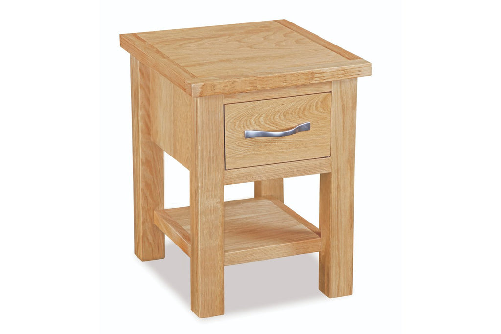 Wooden side table with a drawer on a white background