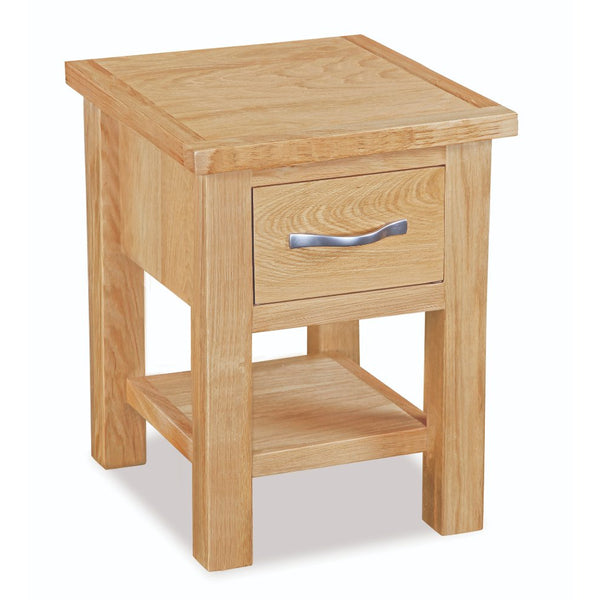 Wooden side table with a drawer on a white background
