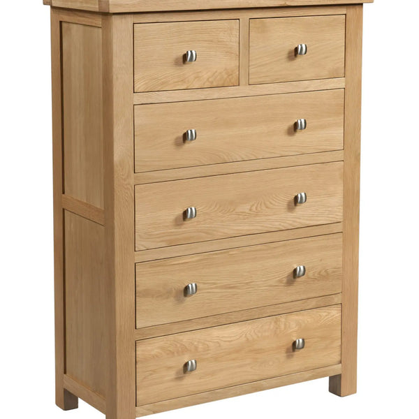 Wooden dresser with multiple drawers on a white background
