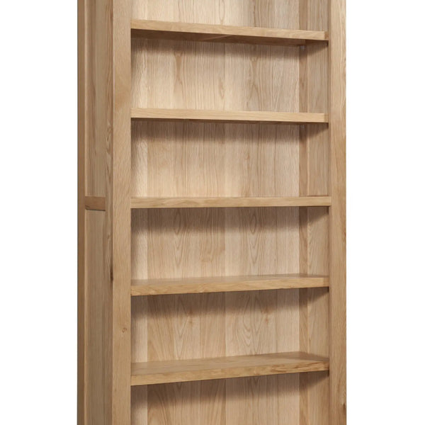 Wooden bookshelf with six shelves on a white background