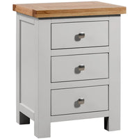 Gray nightstand with three drawers and a wooden top on a white background