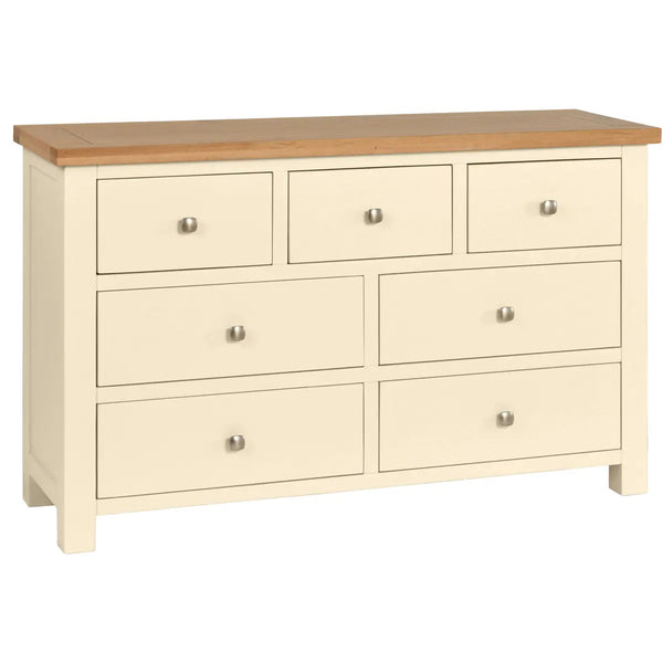 Wooden dresser with six drawers, four on the bottom and two on the top, on a white background.