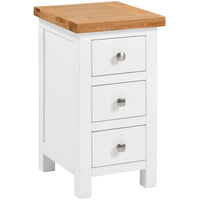White nightstand with three drawers and a wooden top on a white background
