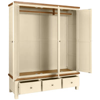 Beige wardrobe with wooden accents and open doors on a white background