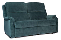 Denim blue sofa on a white background