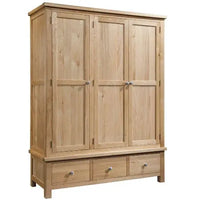Wooden wardrobe with three doors and three drawers on a white background