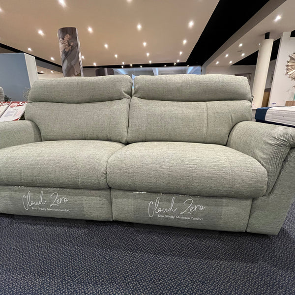 Grey sofa with 'Cloud Zero' branding in a showroom setting