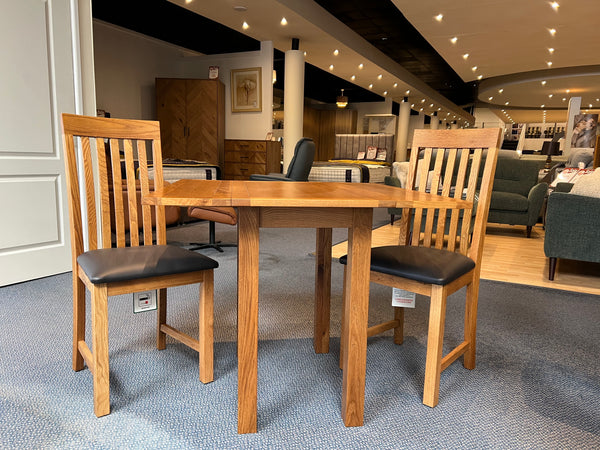 Dorset rustic oak drop leaf table and two chairs