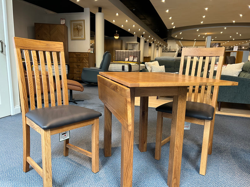 Dorset rustic oak drop leaf table and two chairs