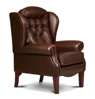 Brown leather armchair on a white background