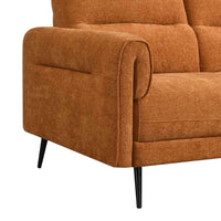Close-up of an orange sofa with black legs on a white background
