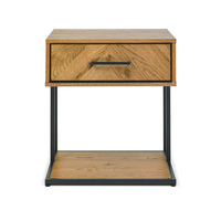 Wooden side table with a drawer on a white background