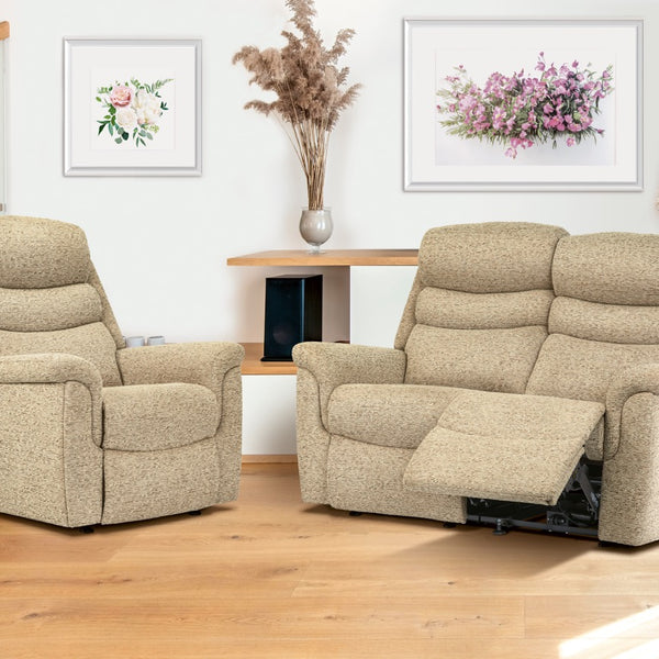 Beige recliner sofa set in a living room with wooden flooring and decorative elements.
