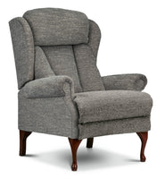 Neutral coloured fireside chair static and scroll arms