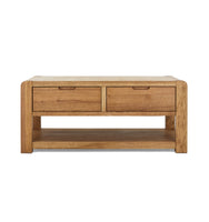 Wooden coffee table with two drawers on a white background