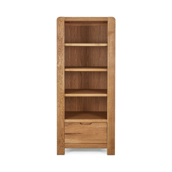 Wooden bookshelf with four shelves and a drawer on a white background
