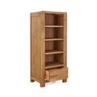 Wooden bookshelf with a drawer on a white background