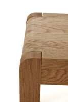 Close-up of a wooden stool with a white background