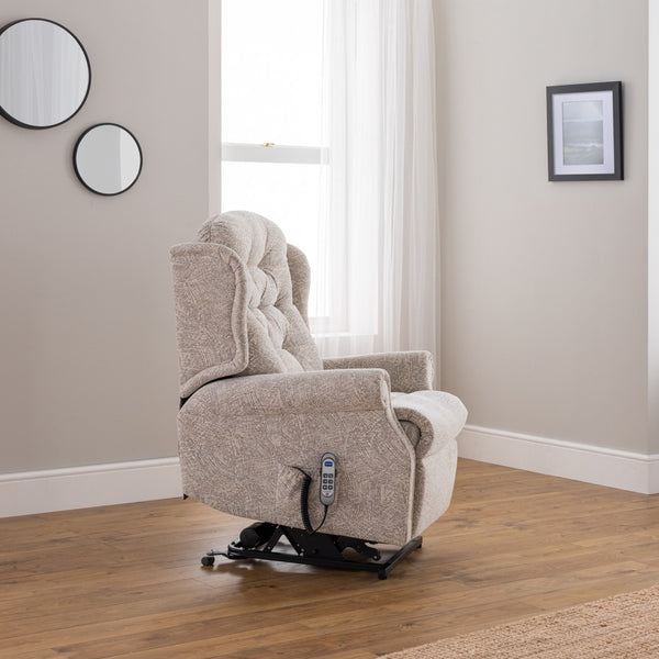 Beige recliner chair in a room with mirrors and a framed picture on the wall.